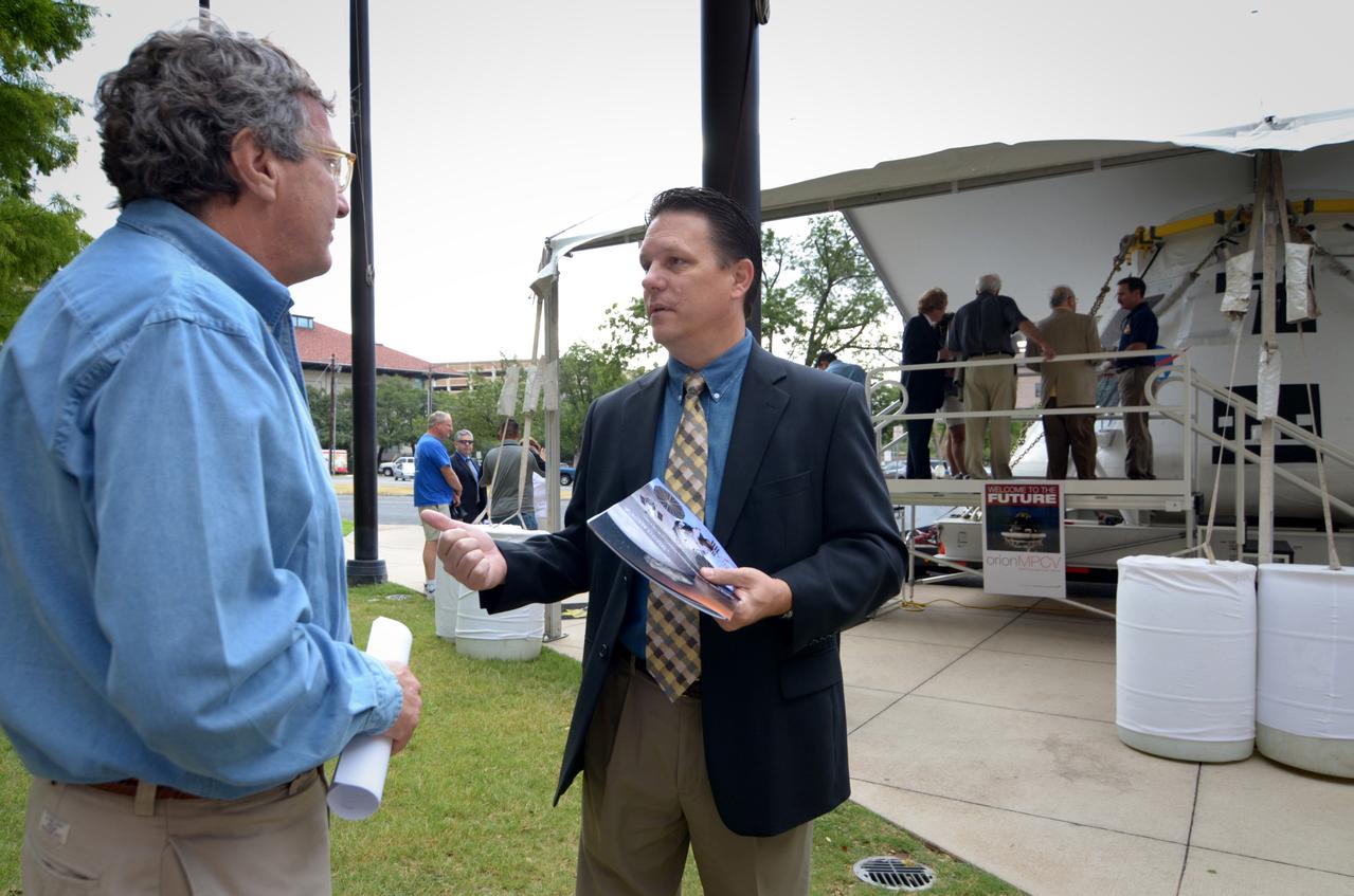Visitors prepare to view the Orion crew module flown on NASA’s Pad Abort-1 (PA-1) flight test, which is on display at an event at the Bullock Texas State History Museum in Austin, Texas on June 20, 2011. Part of Batch image transfer from Flickr.