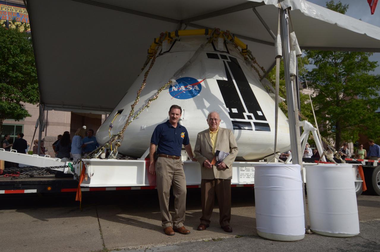 Visitors prepare to view the Orion crew module flown on NASA’s Pad Abort-1 (PA-1) flight test, which is on display at an event at the Bullock Texas State History Museum in Austin, Texas on June 20, 2011. Part of Batch image transfer from Flickr.