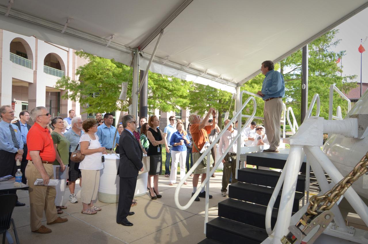 Visitors prepare to view the Orion crew module flown on NASA’s Pad Abort-1 (PA-1) flight test, which is on display at an event at the Bullock Texas State History Museum in Austin, Texas on June 20, 2011. Part of Batch image transfer from Flickr.
