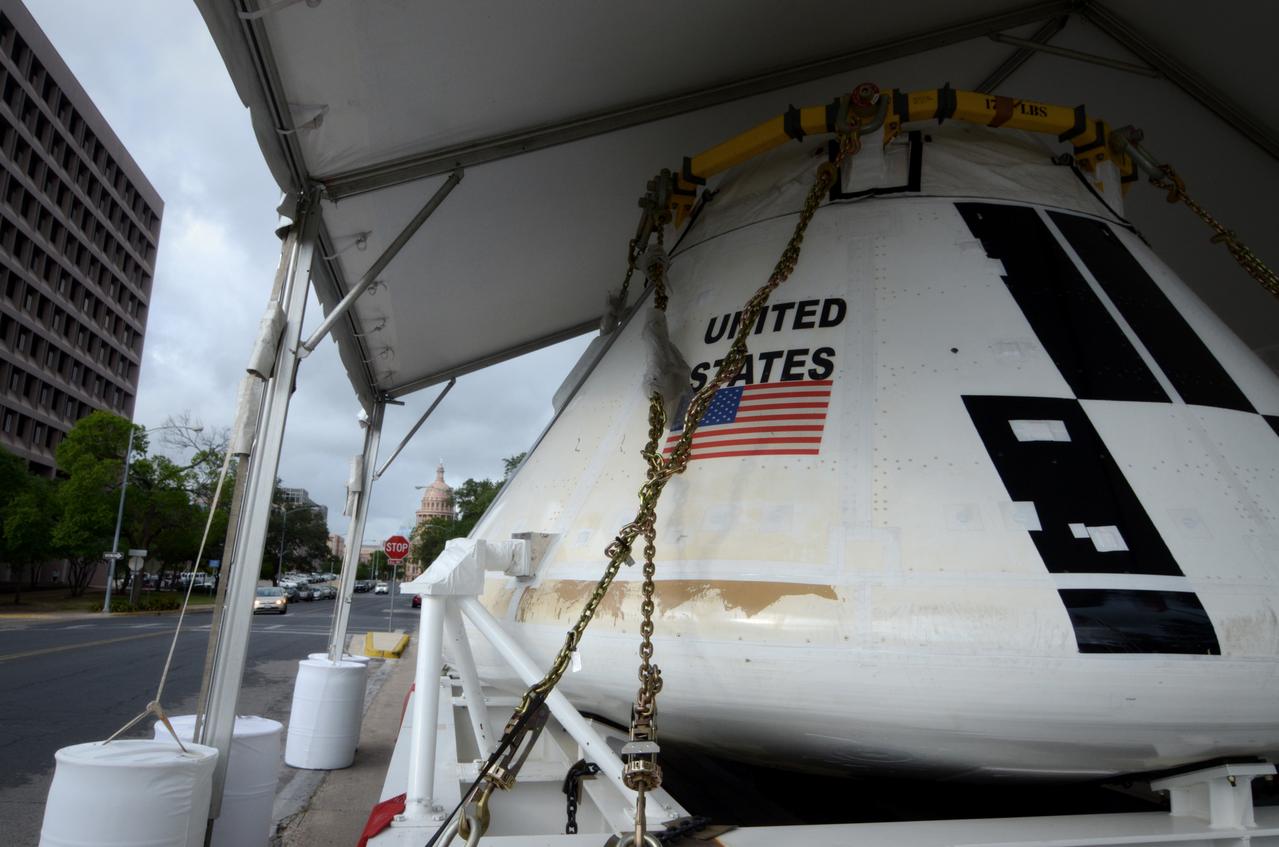 Visitors prepare to view the Orion crew module flown on NASA’s Pad Abort-1 (PA-1) flight test, which is on display at an event at the Bullock Texas State History Museum in Austin, Texas on June 20, 2011. Part of Batch image transfer from Flickr.