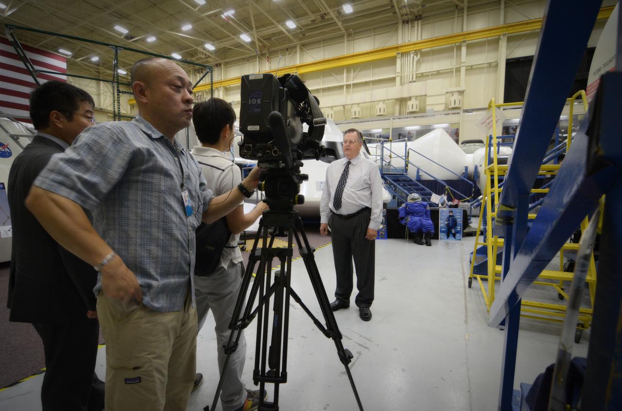 Members of the media attend a Media Day event and visit the Orion mockup in the Space Vehicle Mockup Facility in Building 9 of the Johnson Space Center in Houston on July 1, 2011. Part of Batch image transfer from Flickr.