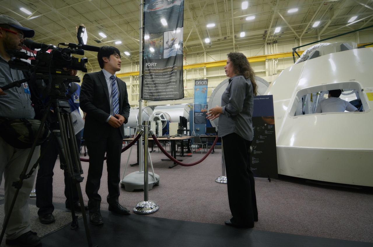 Members of the media attend a Media Day event and visit the Orion mockup in the Space Vehicle Mockup Facility in Building 9 of the Johnson Space Center in Houston on July 1, 2011. Part of Batch image transfer from Flickr.