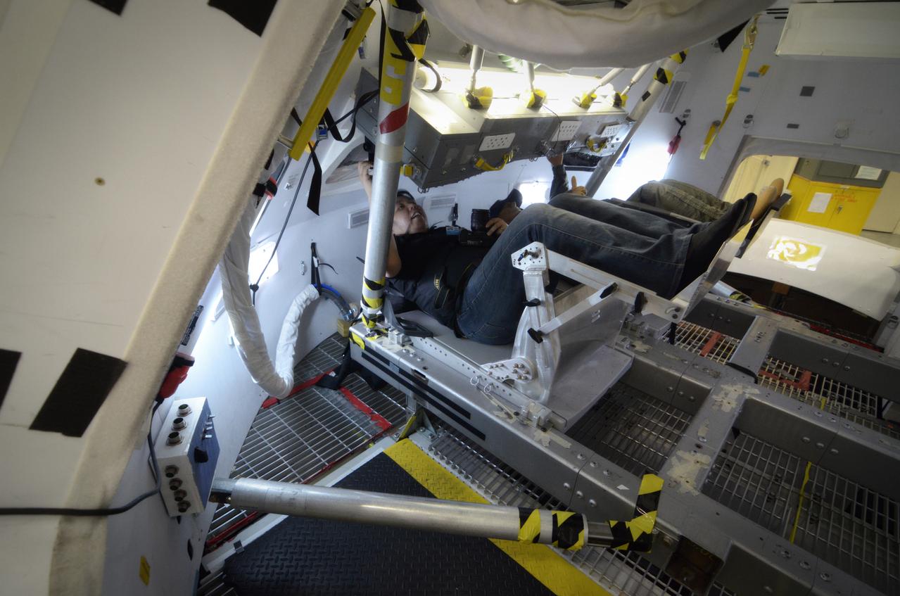 Members of the media attend a Media Day event and visit the Orion mockup in the Space Vehicle Mockup Facility in Building 9 of the Johnson Space Center in Houston on July 1, 2011. Part of Batch image transfer from Flickr.