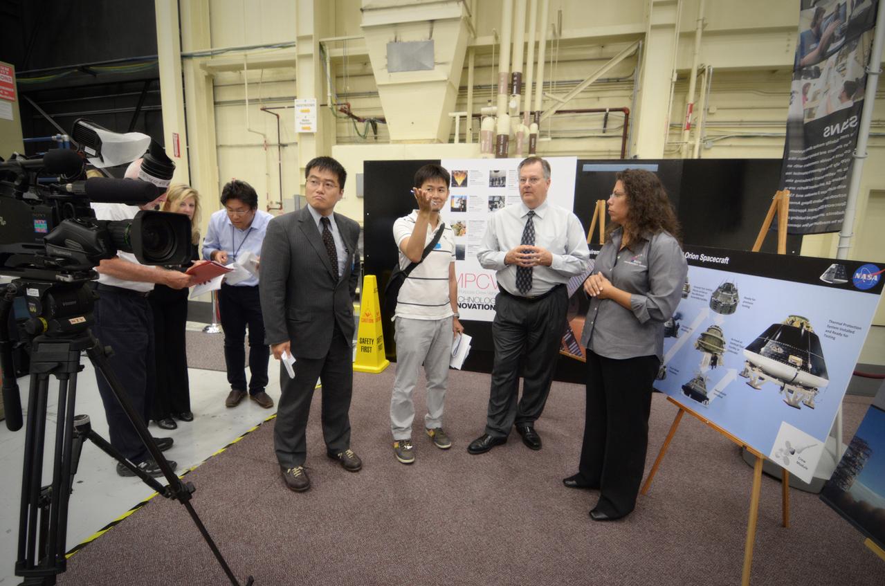 Members of the media attend a Media Day event and visit the Orion mockup in the Space Vehicle Mockup Facility in Building 9 of the Johnson Space Center in Houston on July 1, 2011. Part of Batch image transfer from Flickr.