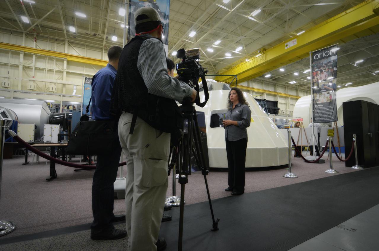 Members of the media attend a Media Day event and visit the Orion mockup in the Space Vehicle Mockup Facility in Building 9 of the Johnson Space Center in Houston on July 1, 2011. Part of Batch image transfer from Flickr.