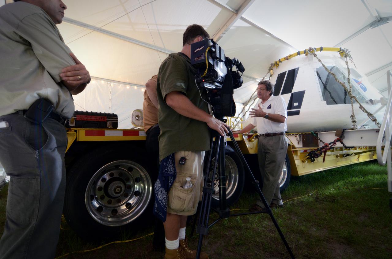 The Orion crew module flown on NASA’s Pad Abort-1 (PA-1) flight test is shown on display at an event at Kennedy Space Center in Florida on July 6, 2011 before moving into the Operations &amp; Checkout (O&amp;C) Building.  Part of Batch image transfer from Flickr.