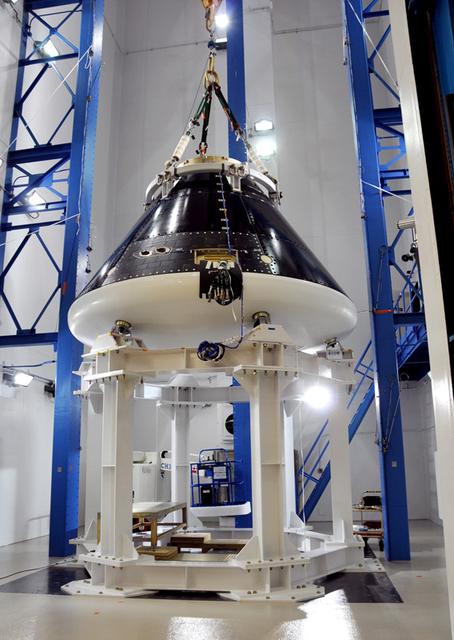 The Orion crew module test article begins acoustical testing in the Reverberant Acoustics Laboratory (RAL) at the Lockheed Martin facility in Waterton, Colorado on July 7, 2011. The testing of approximately 150dB simulated sound pressure levels that the vehicle will encounter during launch, ascent, and if required, abort. The facility’s high ceilings also accommodate the launch abort system test article, which was attached to the crew module for subsequent acoustic tests. Part of Batch image transfer from Flickr.