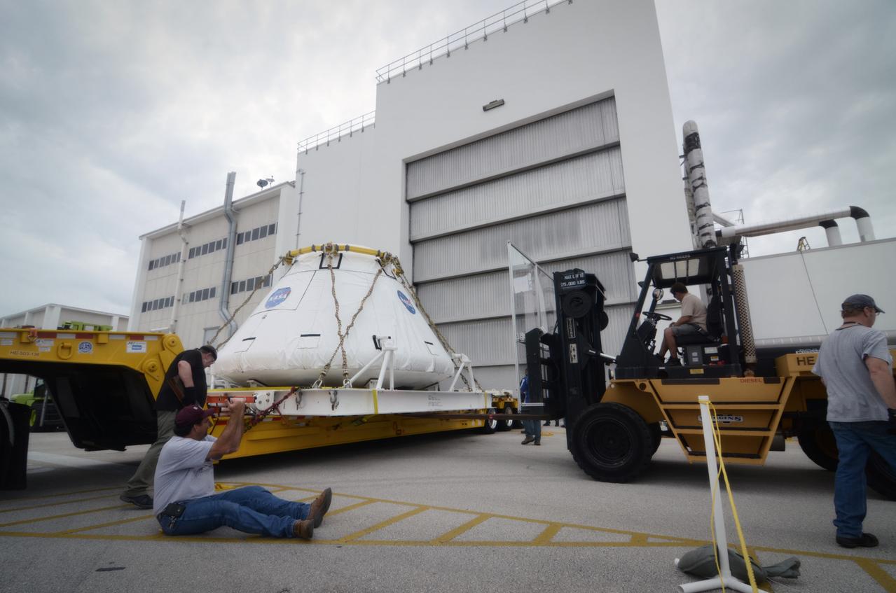 The Orion Pad Abort-1 (PA-1) crew module is prepared to enter the Operations &amp; Checkout (O&amp;C) Building at Kennedy Space Center in Florida on July 11, 2011. Part of Batch image transfer from Flickr.