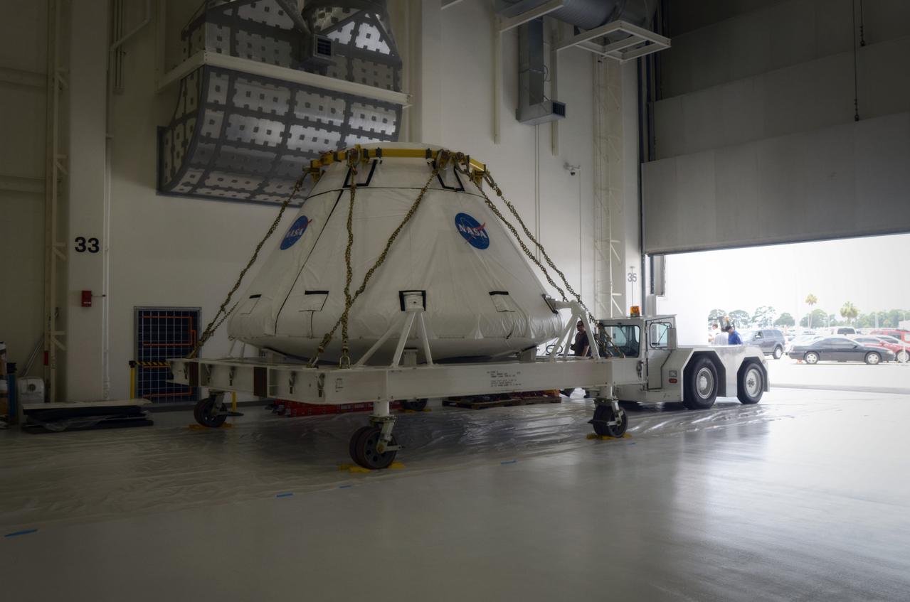 The Orion Pad Abort-1 (PA-1) crew module is pushed into the airlock at the Operations &amp; Checkout (O&amp;C) Building at Kennedy Space Center in Florida on July 11, 2011. Part of Batch image transfer from Flickr.