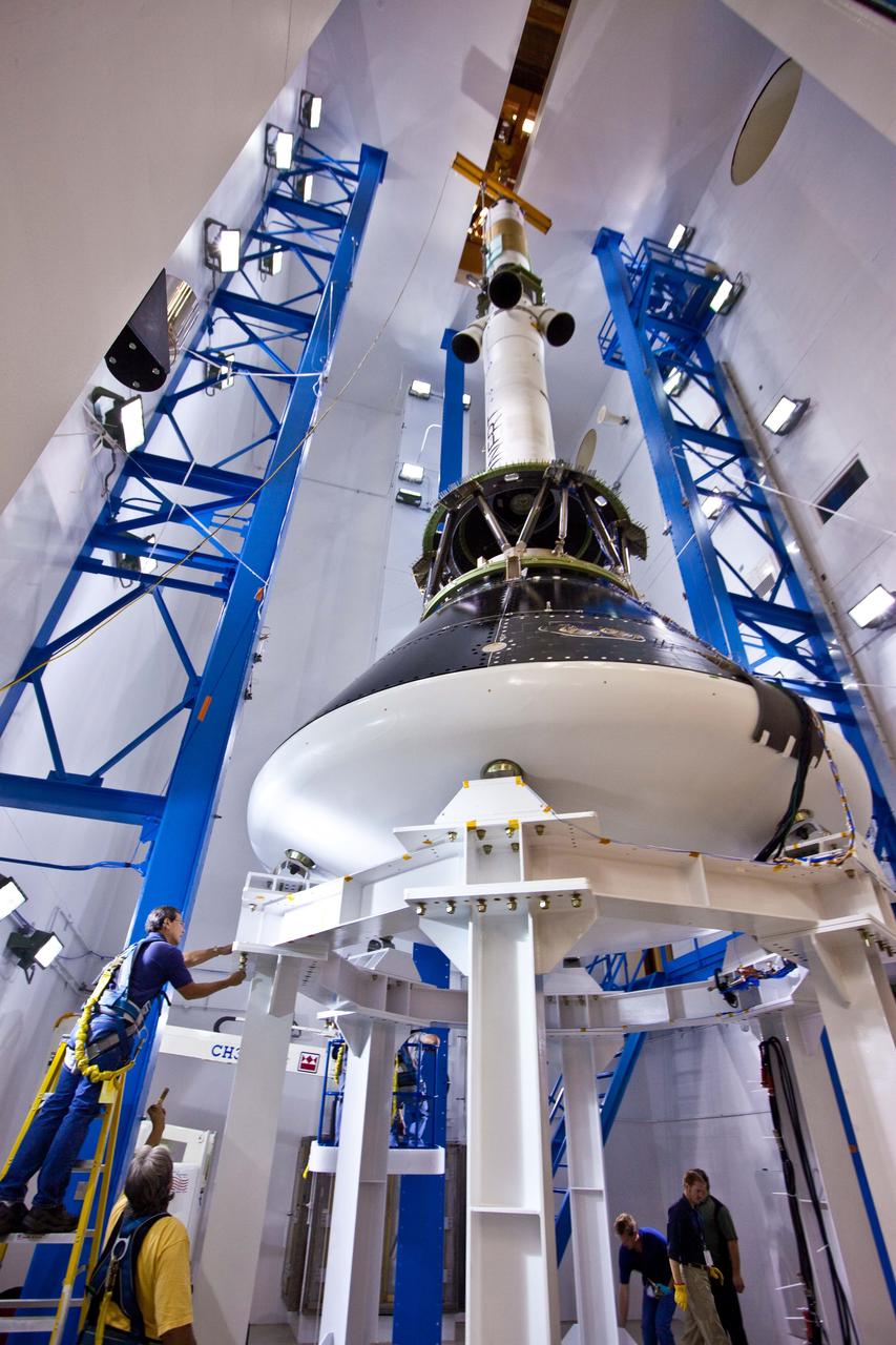 The Orion launch abort system and crew module test articles undergo stacking at Lockheed Martin’s facilities near Denver in preparation for acoustic testing on Aug. 15, 2011. To emulate the sound pressure levels experienced at launch, the tests exposed Orion and its launch abort system to acoustic levels exceeding 150 decibels, while hundreds of instruments record the vehicle’s response.  Part of Batch image transfer from Flickr.