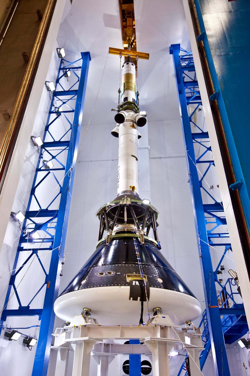 The Orion launch abort system and crew module test articles undergo stacking at Lockheed Martin’s facilities near Denver in preparation for acoustic testing on Aug. 15, 2011. To emulate the sound pressure levels experienced at launch, the tests exposed Orion and its launch abort system to acoustic levels exceeding 150 decibels, while hundreds of instruments record the vehicle’s response.  Part of Batch image transfer from Flickr.