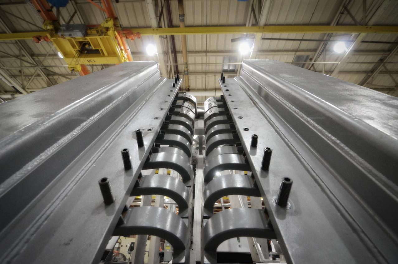 Elements for the Exploration Flight Test-1 (EFT-1) Orion pressure vessel are prepared for welding at NASA’s Michoud Assembly Facility in New Orleans on Sept. 7, 2011. Orion’s pressure vessel is underlying frame of the crew module that will provide an air-tight, habitable space for astronauts on future missions to the Moon. Part of Batch image transfer from Flickr.