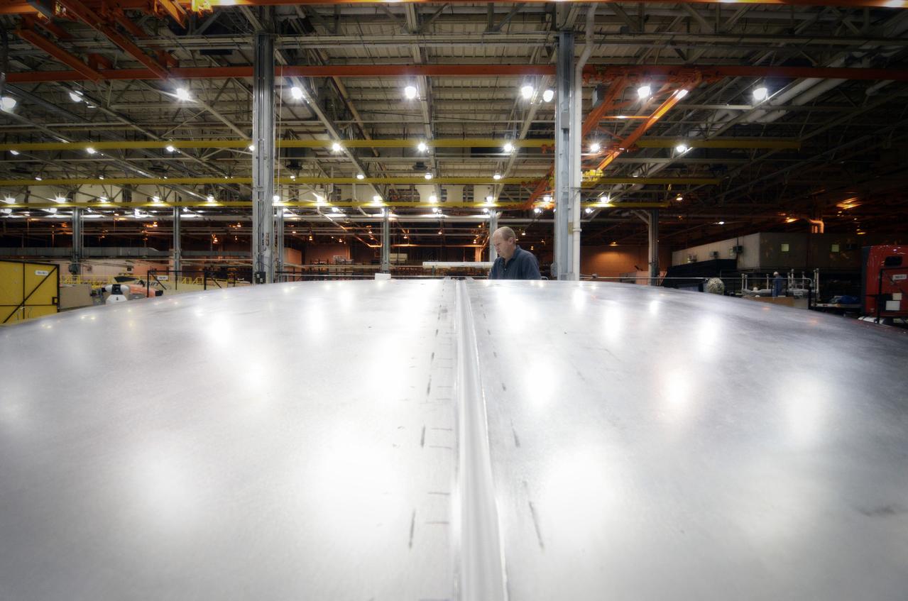 Elements for the Exploration Flight Test-1 (EFT-1) Orion pressure vessel are prepared for welding at NASA’s Michoud Assembly Facility in New Orleans on Sept. 7, 2011. Orion’s pressure vessel is underlying frame of the crew module that will provide an air-tight, habitable space for astronauts on future missions to the Moon. Part of Batch image transfer from Flickr.