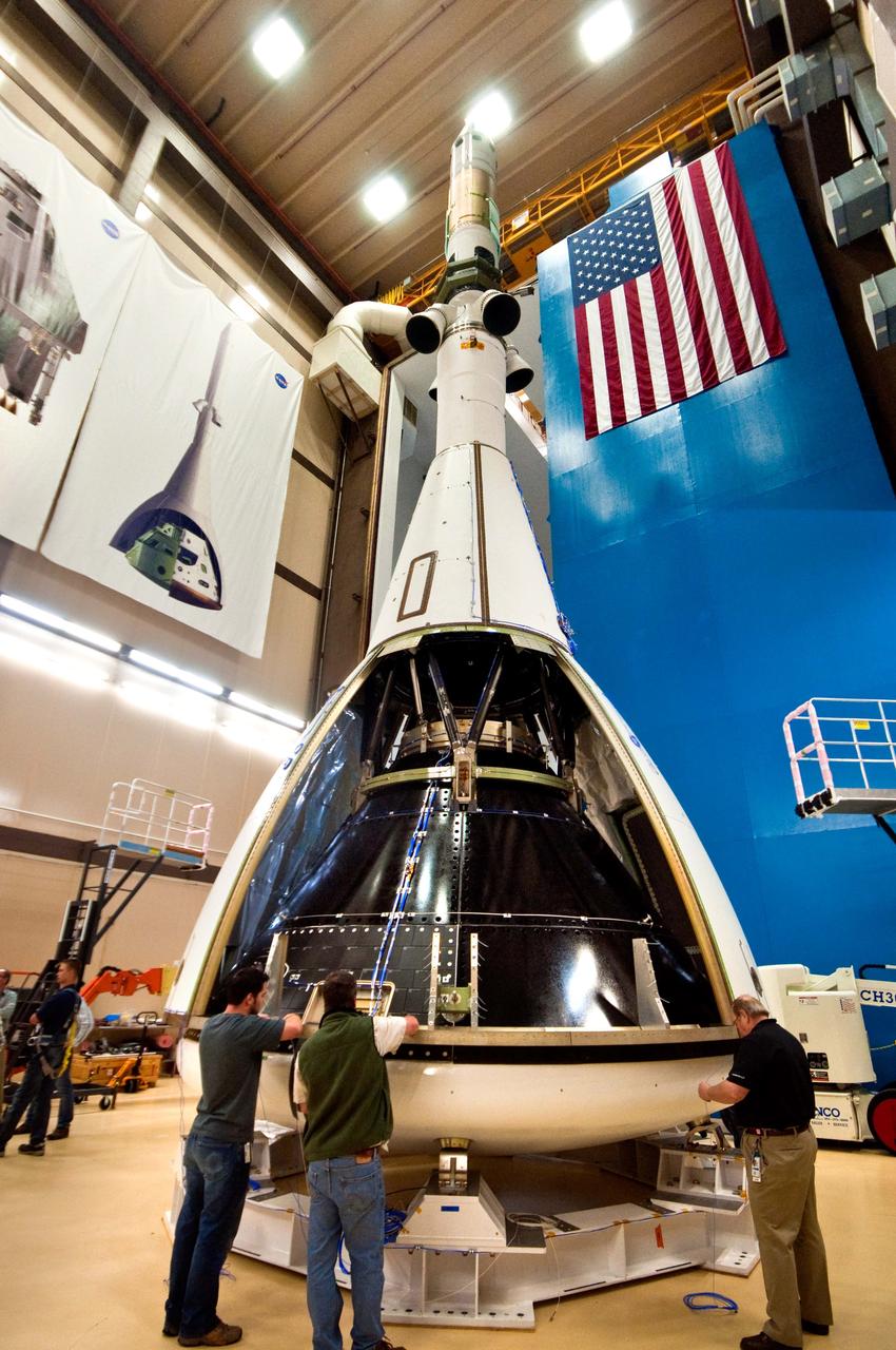 The launch abort system ogives are installed on the Orion test article at Lockheed Martin facilities near Denver on Sept. 8, 2011. The ogives are four protective panels that shield the crew module from the severe vibrations and sounds experienced during launch. Part of Batch image transfer from Flickr.