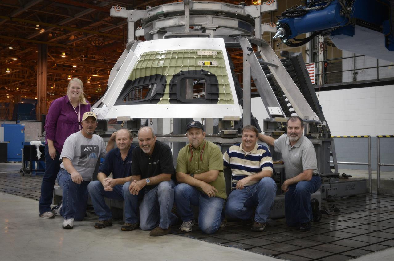 Technicians begin welding the Exploration Flight Test-1 (EFT-1) Orion pressure vessel at NASA’s Michoud Assembly Facility in New Orleans on Sept. 9, 2011. Orion’s pressure vessel is underlying frame of the crew module that will provide an air-tight, habitable space for astronauts on future missions to the Moon. Part of Batch image transfer from Flickr.