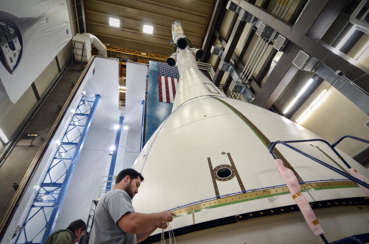 The Orion ground test vehicle is prepared for the Launch Abort Vehicle Configuration Test at Lockheed Martin's facilities in Denver on Sept. 14, 2011. For this test, the vehicle was covered with fillets and ogive panels that resemble the vehicle's launch configuration. The spacecraft underwent testing at sound pressure levels that emulate those experienced at launch and in the event an abort is needed to carry the crew to safety away from a potential problem on the launch pad or during ascent. Part of Batch image transfer from Flickr.