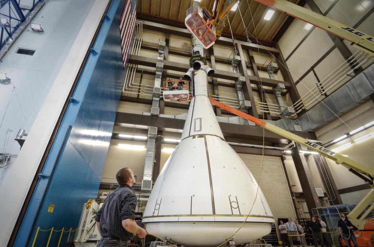 The Orion ground test vehicle is prepared for the Launch Abort Vehicle Configuration Test at Lockheed Martin's facilities in Denver on Sept. 15, 2011. For this test, the vehicle was covered with fillets and ogive panels that resemble the vehicle's launch configuration. The spacecraft underwent testing at sound pressure levels that emulate those experienced at launch and in the event an abort is needed to carry the crew to safety away from a potential problem on the launch pad or during ascent. Part of Batch image transfer from Flickr.