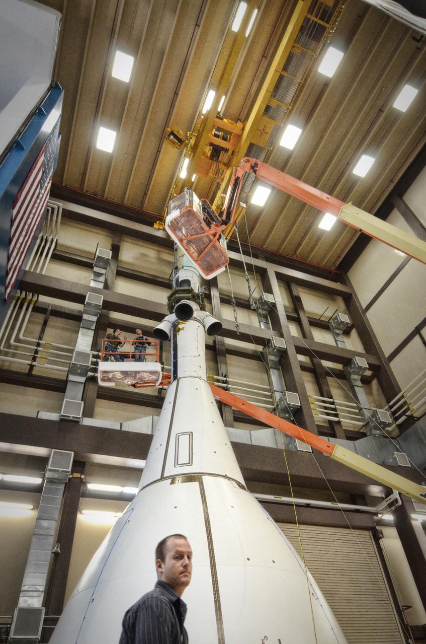 The Orion ground test vehicle is prepared for the Launch Abort Vehicle Configuration Test at Lockheed Martin's facilities in Denver on Sept. 15, 2011. For this test, the vehicle was covered with fillets and ogive panels that resemble the vehicle's launch configuration. The spacecraft underwent testing at sound pressure levels that emulate those experienced at launch and in the event an abort is needed to carry the crew to safety away from a potential problem on the launch pad or during ascent. Part of Batch image transfer from Flickr.