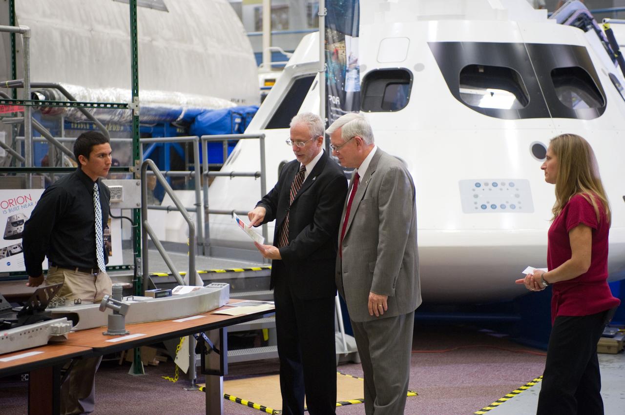 JSC Director Mike Coats and Orion Program Manager Mark Geyer tour the Orion mockups in Bldg. 9 at Johnson Space Center in Houston followed by a short Q&amp;A in front of the mockup on Sept. 26, 2011. Part of Batch image transfer from Flickr. 
