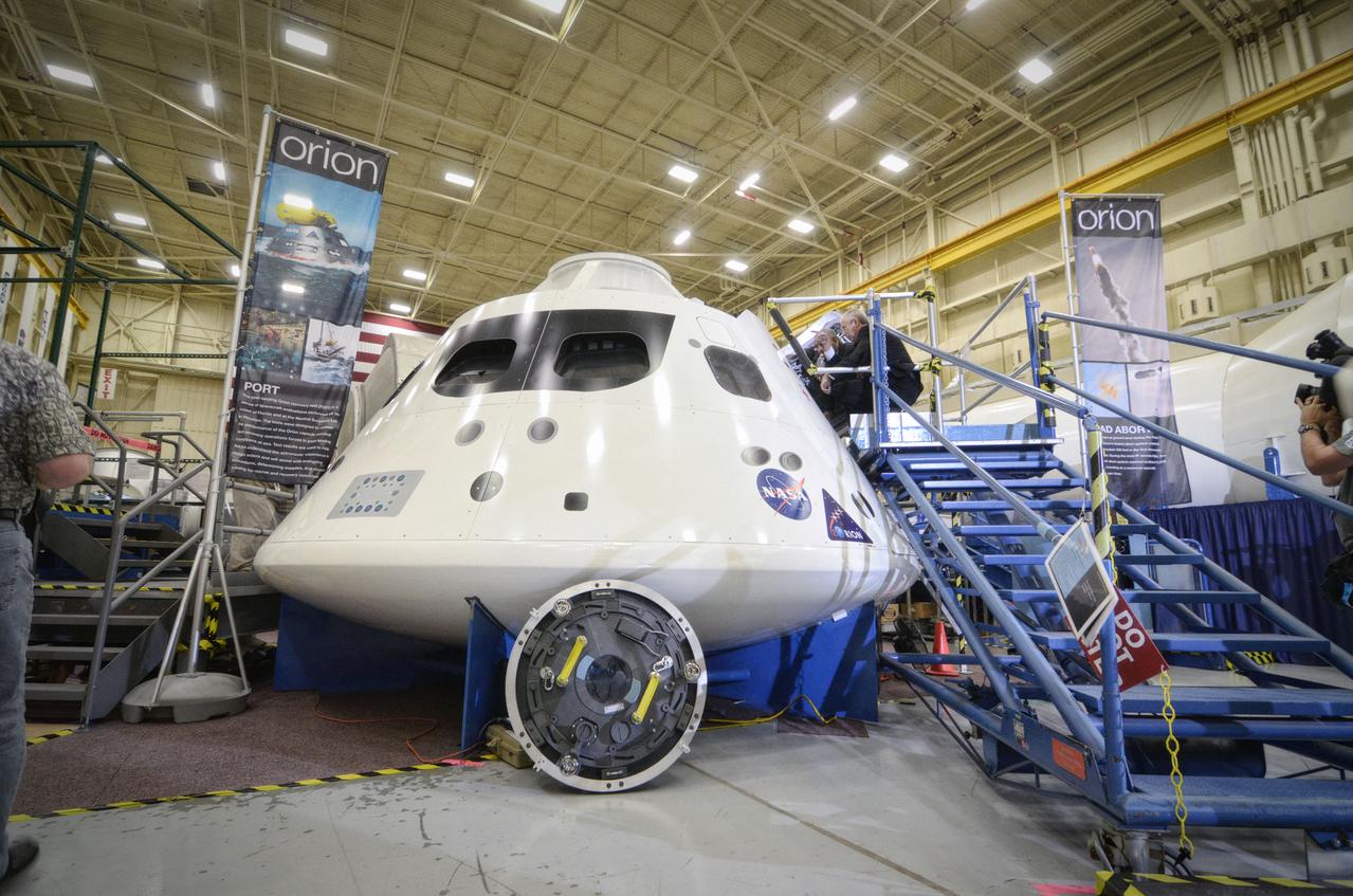 NASA Administrator Charlie Bolden, accompanied by JSC Director Mike Coats and Orion Program Manager Mark Geyer, tours the Orion mockups in Bldg. 9 at Johnson Space Center in Houston followed by a short Q&amp;A in front of the mockup on Sept. 26, 2011.  Part of Batch image transfer from Flickr. 