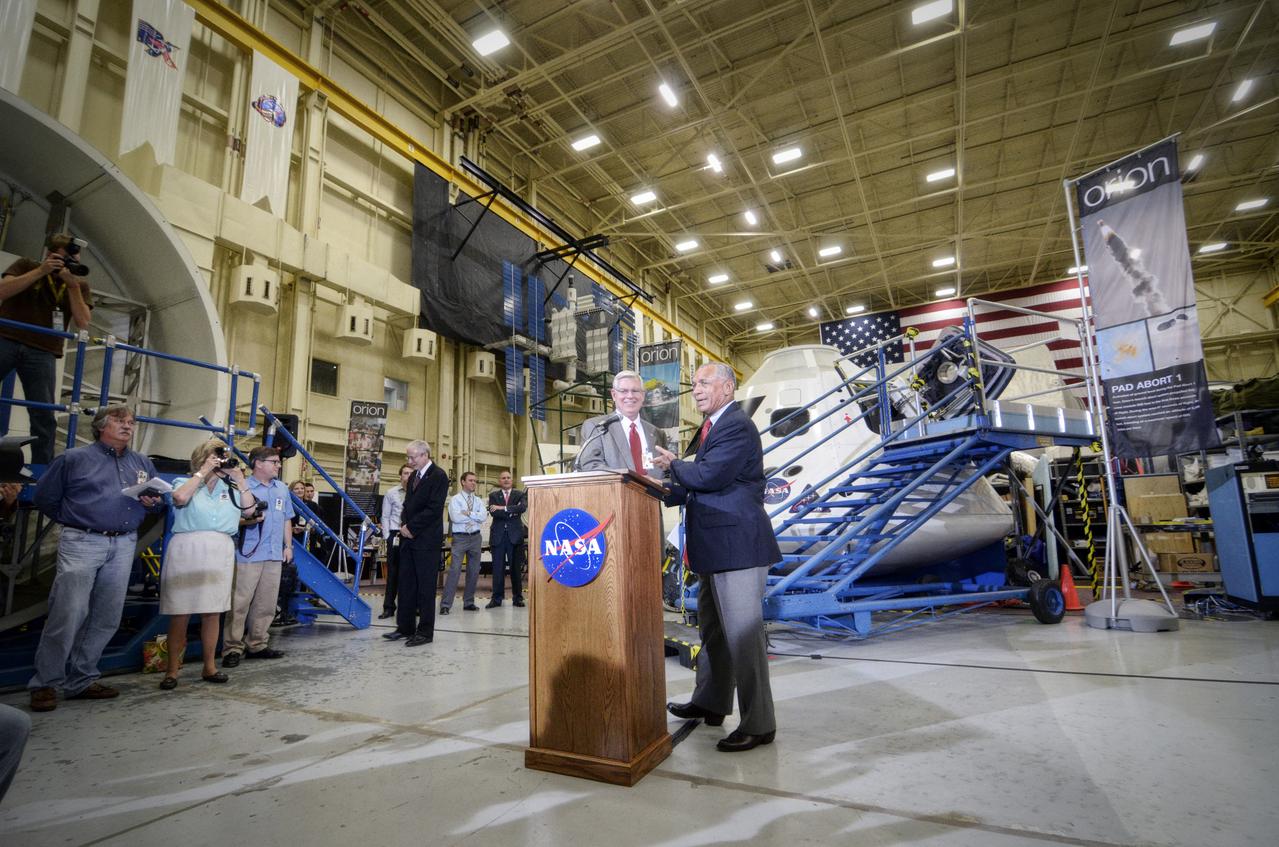 NASA Administrator Charlie Bolden and JSC Director Mike Coats at podium after tour of the Orion mockups in Bldg. 9 at Johnson Space Center in Houston followed by a short Q&amp;A in front of the mockup on Sept. 26, 2011. Part of Batch image transfer from Flickr. 