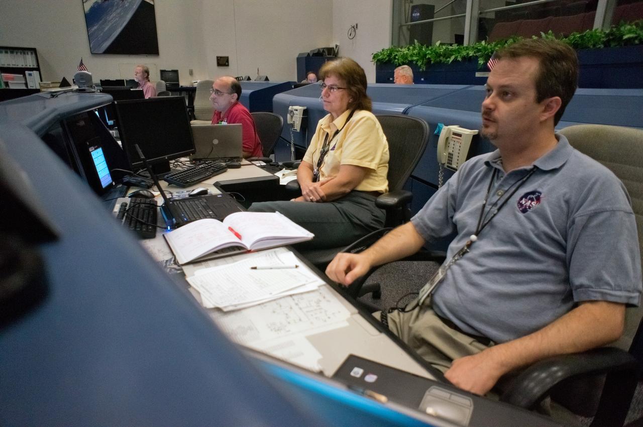 The Orion avionics team participates in a successful End to End 02 test between Mission Control Center (MCC) Houston and the Communications and Tracking Integrated Lab in Denver on Oct. 16, 2011. The team successfully flowed telemetry over RF link to the MCC, sent the first encrypted command from MCC to Orion, demonstrated full end to end video link capability, and downlinked test video file in a file transfer. Part of Batch image transfer from Flickr. 