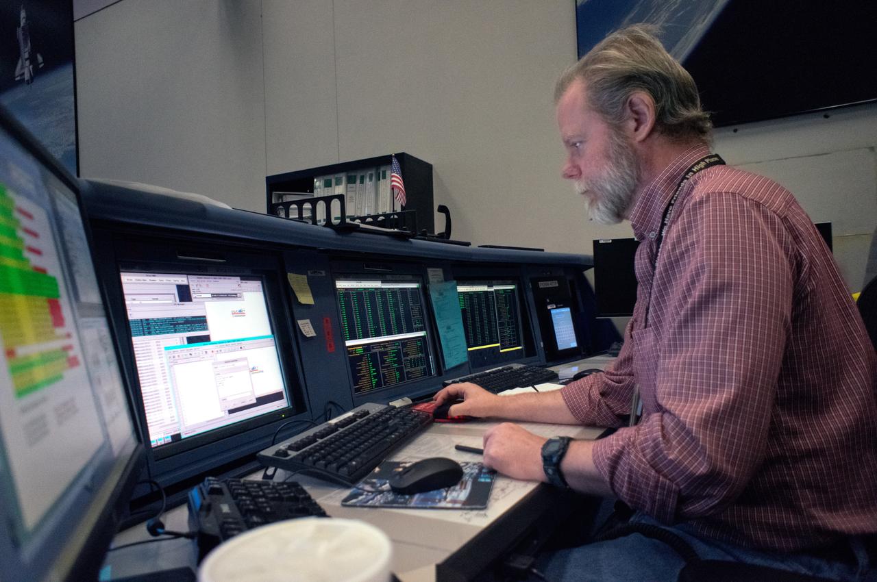 The Orion avionics team participates in a successful End to End 02 test between Mission Control Center (MCC) Houston and the Communications and Tracking Integrated Lab in Denver on Oct. 16, 2011. The team successfully flowed telemetry over RF link to the MCC, sent the first encrypted command from MCC to Orion, demonstrated full end to end video link capability, and downlinked test video file in a file transfer. Part of Batch image transfer from Flickr. 