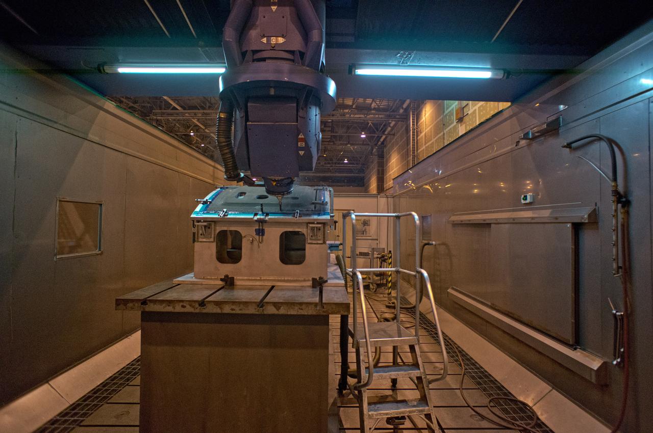 Composite crew module adapter (CMA) panels for the Exploration Flight Test-1 Orion are manufactured using computer numerical control (CNC) machining at NASA's Michoud Assembly Facility in New Orleans on Nov. 11, 2011. Part of Batch image transfer from Flickr.