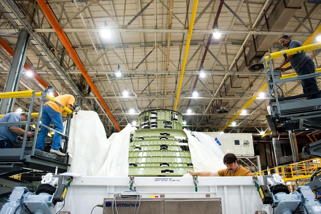 The completed Exploration Flight Test-1 (EFT-1) Orion crew module pressure vessel is packed for shipment to NASA's Kennedy Space Center at NASA's Michoud Assembly Facility in New Orleans on June 26, 2011. Part of Batch image transfer from Flickr. 