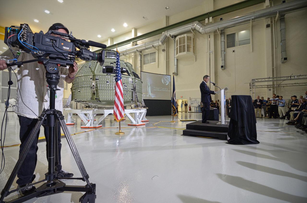 The Orion crew module pressure vessel for Exploration Flight Test-1 (EFT-1) is unveiled at a ceremony at the Operations and Checkout (O&amp;C) Building at NASA’s Kennedy Space Center in Florida on July 2, 2012. Robert Cabana is visible at podium. Part of Batch image transfer from Flickr. 