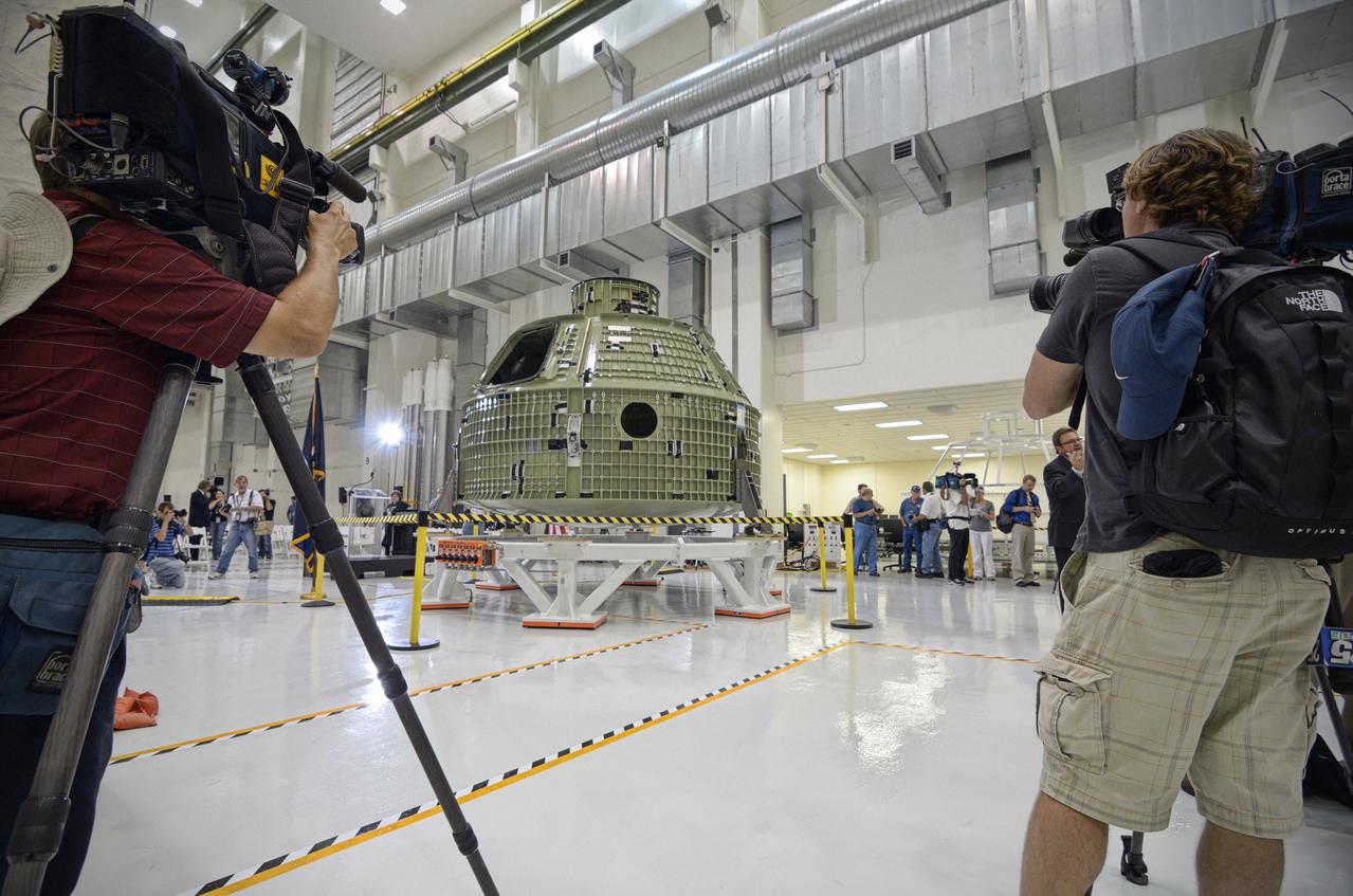 The Orion crew module pressure vessel for Exploration Flight Test-1 (EFT-1) is unveiled at a ceremony at the Operations and Checkout (O&amp;C) Building at NASA’s Kennedy Space Center in Florida on July 2, 2012.  Part of Batch image transfer from Flickr. 
