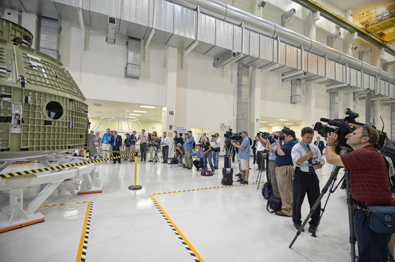 The Orion crew module pressure vessel for Exploration Flight Test-1 (EFT-1) is unveiled at a ceremony at the Operations and Checkout (O&amp;C) Building at NASA’s Kennedy Space Center in Florida on July 2, 2012.  Part of Batch image transfer from Flickr. 