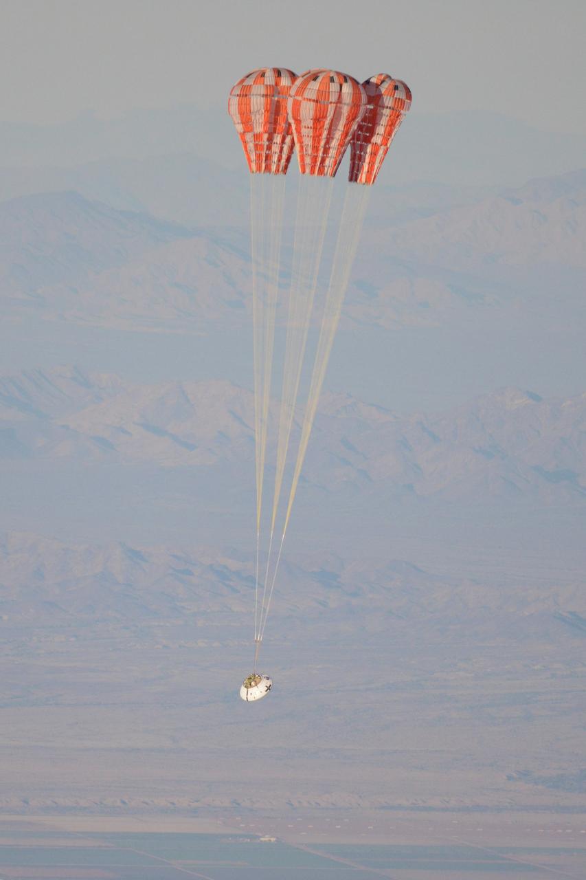 Orion teams perform an Orion Capsule Parachute Assembly System (CPAS) drop test using the Parachute Test Vehicle (PTV) at the U.S. Army Yuma Proving Ground in Yuma, Arizona on Dec. 20, 2012. Part of Batch image transfer from Flickr.
