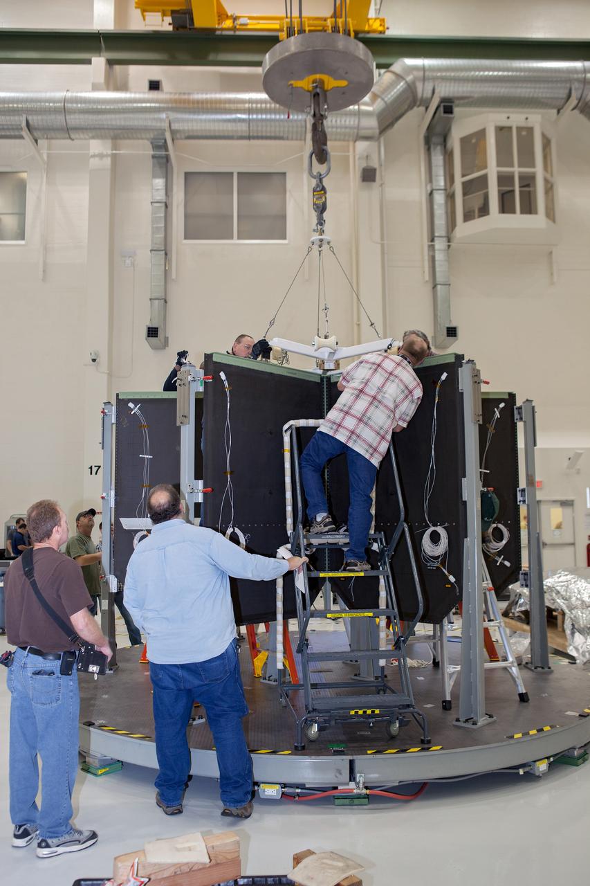 Work continues on the Exploration Flight Test-1 (EFT-1) Orion crew module in the Operations and Checkout Building (O&C) at Kennedy Space Center on March 21, 2013. Part of Batch image transfer from Flickr.