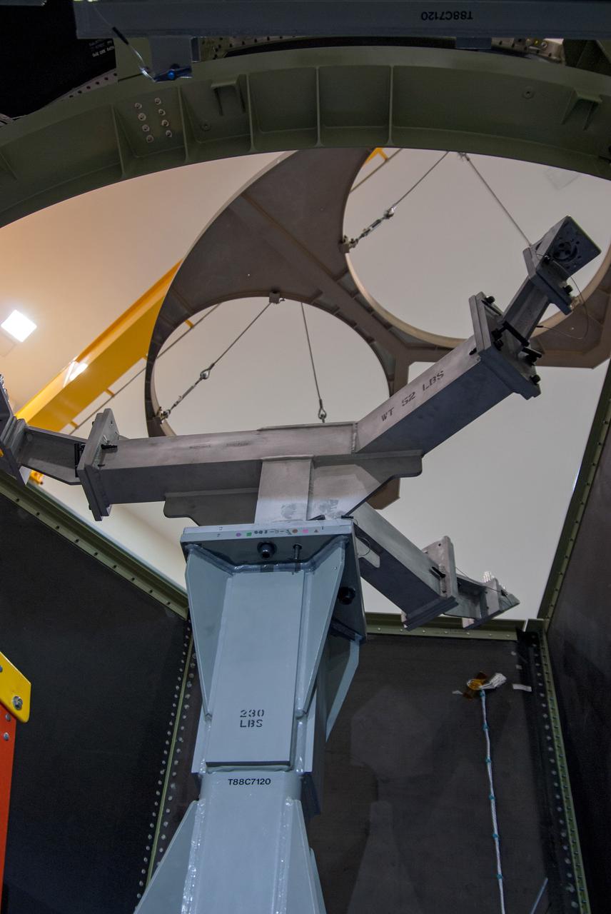 Technicians work on assembly of the Exploration Flight Test-1 (EFT-1) Orion service module mass simulator at the Operations and Checkout (O&C) Building at Kennedy Space Center on March 22, 2013. Part of Batch image transfer from Flickr.