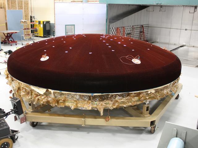 Technicians work on the Exploration Flight Test-1 (EFT-1) Orion heat shield at Textron in Wimington, MA on June 7, 2013. Part of Batch image transfer from Flickr.