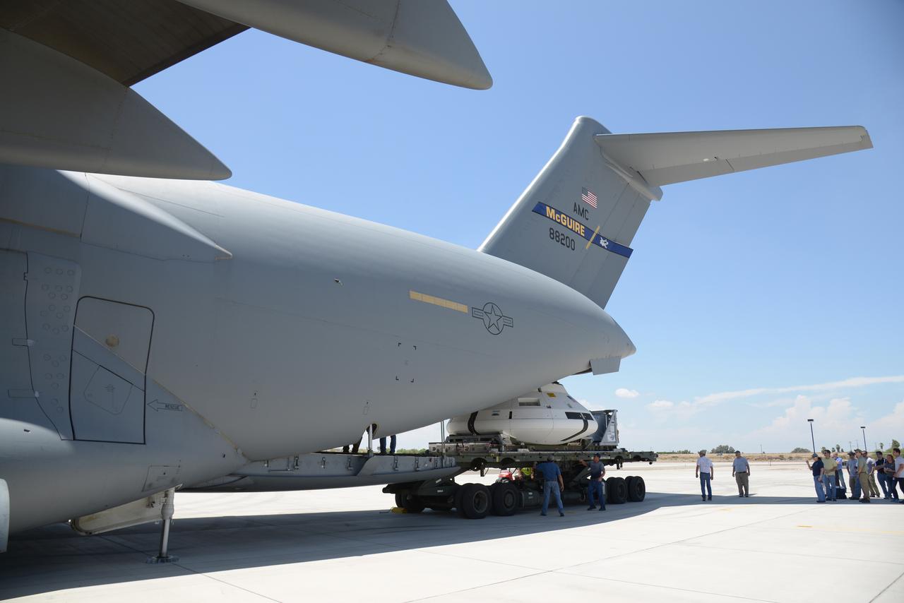 Teams peform Orion Parachute Test Vehicle (PTV) loading operations on July 22, 2013 in preparation for the July 24 parachute drop test at the U.S. Army Yuma Proving Ground in Arizona. Part of Batch image transfer from Flickr.