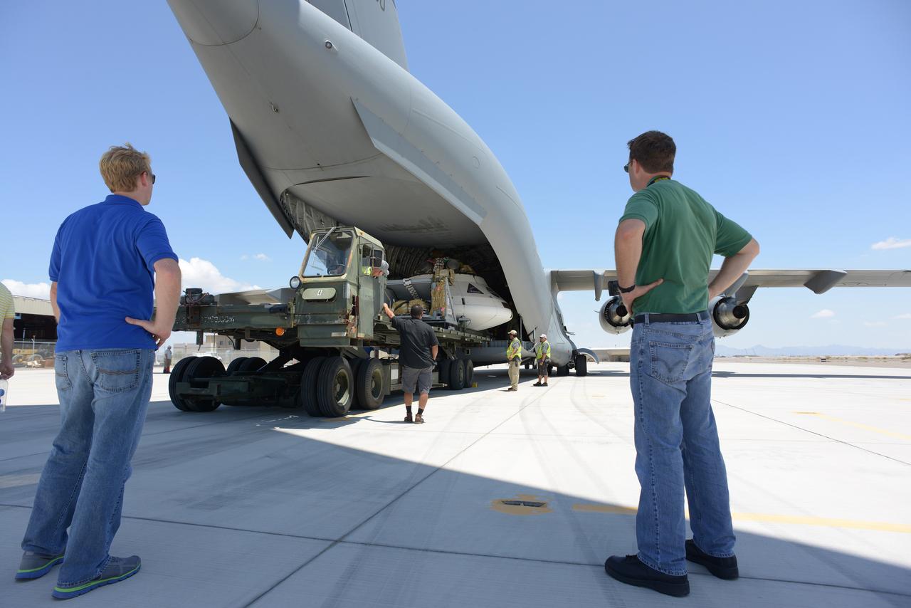 Teams peform Orion Parachute Test Vehicle (PTV) loading operations on July 22, 2013 in preparation for the July 24 parachute drop test at the U.S. Army Yuma Proving Ground in Arizona. Part of Batch image transfer from Flickr.