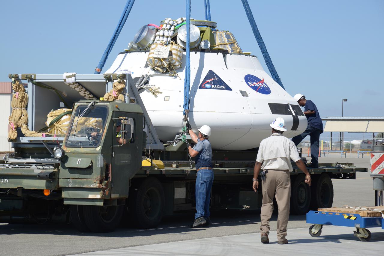 Teams peform Orion Parachute Test Vehicle (PTV) loading operations on July 22, 2013 in preparation for the July 24 parachute drop test at the U.S. Army Yuma Proving Ground in Arizona. Part of Batch image transfer from Flickr.