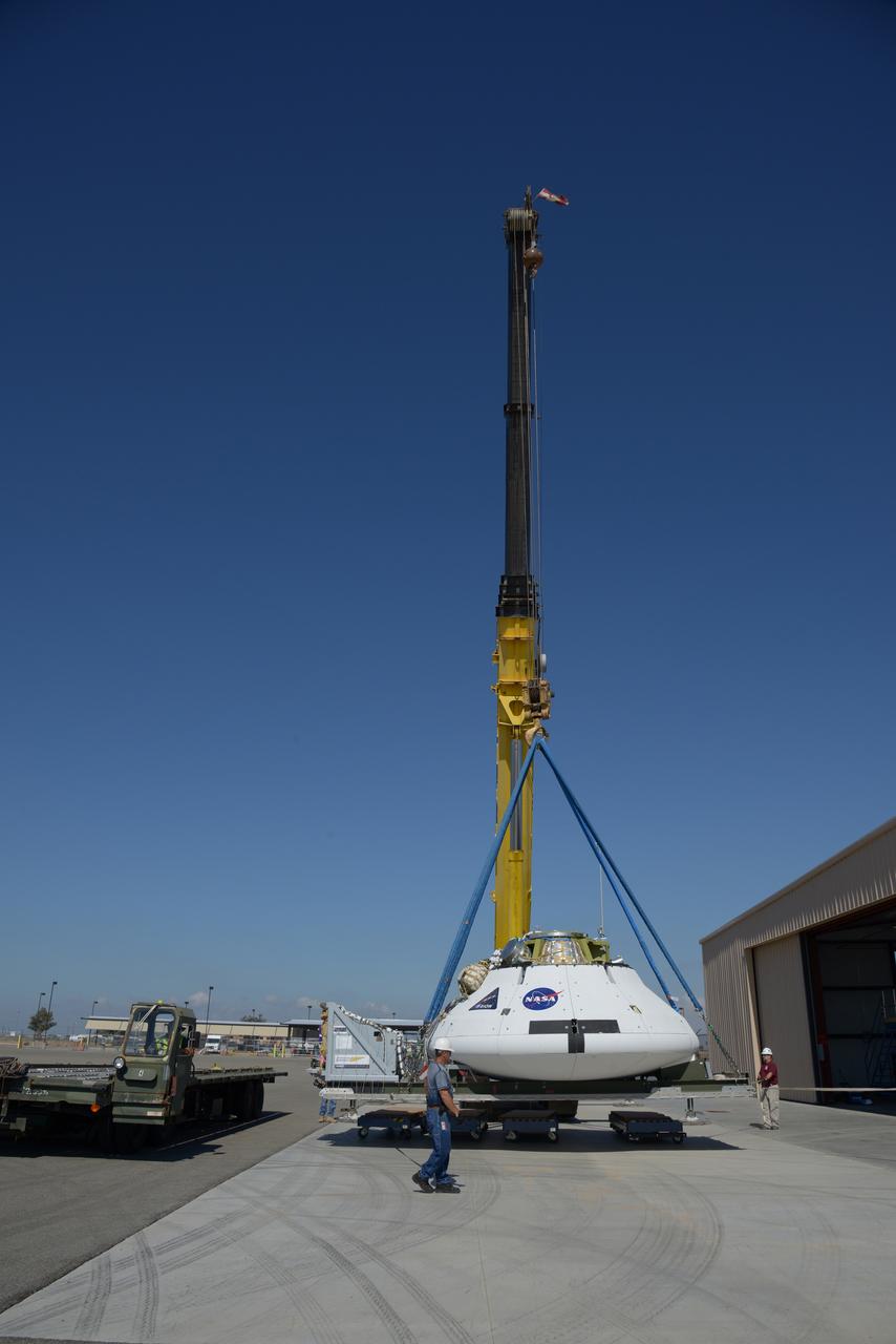 Teams peform Orion Parachute Test Vehicle (PTV) loading operations on July 22, 2013 in preparation for the July 24 parachute drop test at the U.S. Army Yuma Proving Ground in Arizona. Part of Batch image transfer from Flickr.
