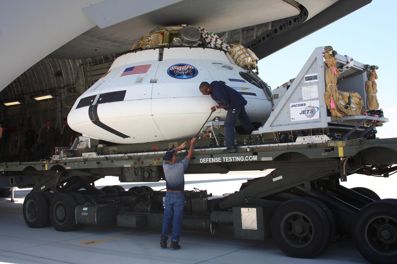 Teams peform Orion Parachute Test Vehicle (PTV) loading operations on July 22, 2013 in preparation for the July 24 parachute drop test at the U.S. Army Yuma Proving Ground in Arizona. Part of Batch image transfer from Flickr.