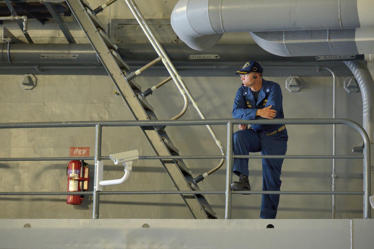 The Orion test capsule undergoes stationary recovery testing in Norfolk, VA on Aug. 13, 2013. NASA and the U.S Navy led the tests using the USS Arlington...The stationary recovery tests allow the teams to demonstrate and evaluate the recovery processes, the hardware and the test personnel in a controlled environment. ..During the test, the U.S Navy Dive Team checked the capsule for hazards while sailors from the USS Arlington approached the capsule in inflatable boats, and towed it back to the ship’s flooded well deck.  Part of Batch image transfer from Flickr.