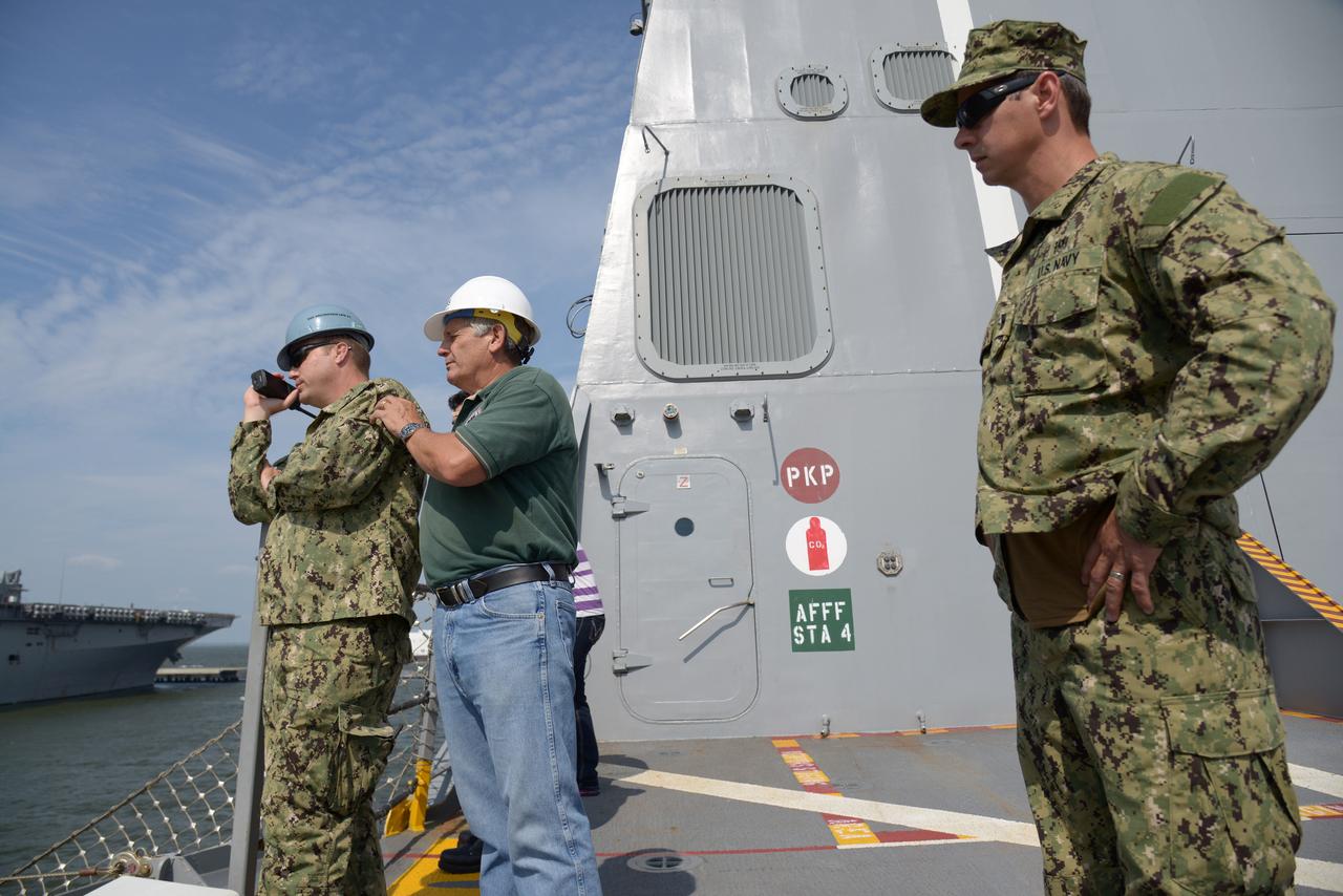 The Orion test capsule undergoes stationary recovery testing in Norfolk, VA on Aug. 13, 2013. NASA and the U.S Navy led the tests using the USS Arlington...The stationary recovery tests allow the teams to demonstrate and evaluate the recovery processes, the hardware and the test personnel in a controlled environment. ..During the test, the U.S Navy Dive Team checked the capsule for hazards while sailors from the USS Arlington approached the capsule in inflatable boats, and towed it back to the ship’s flooded well deck.  Part of Batch image transfer from Flickr.