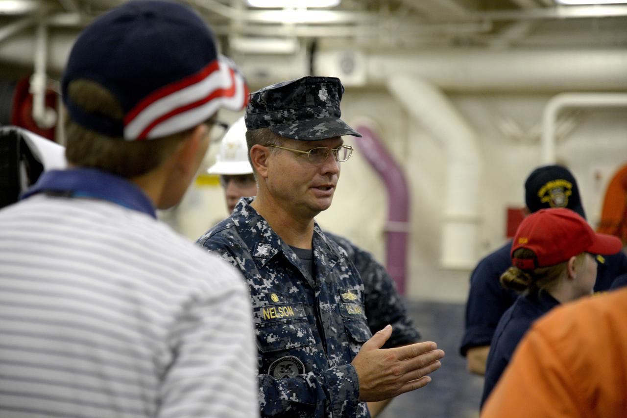 The Orion test capsule undergoes stationary recovery testing in Norfolk, VA on Aug. 13, 2013. NASA and the U.S Navy led the tests using the USS Arlington...The stationary recovery tests allow the teams to demonstrate and evaluate the recovery processes, the hardware and the test personnel in a controlled environment. ..During the test, the U.S Navy Dive Team checked the capsule for hazards while sailors from the USS Arlington approached the capsule in inflatable boats, and towed it back to the ship’s flooded well deck.  Part of Batch image transfer from Flickr.