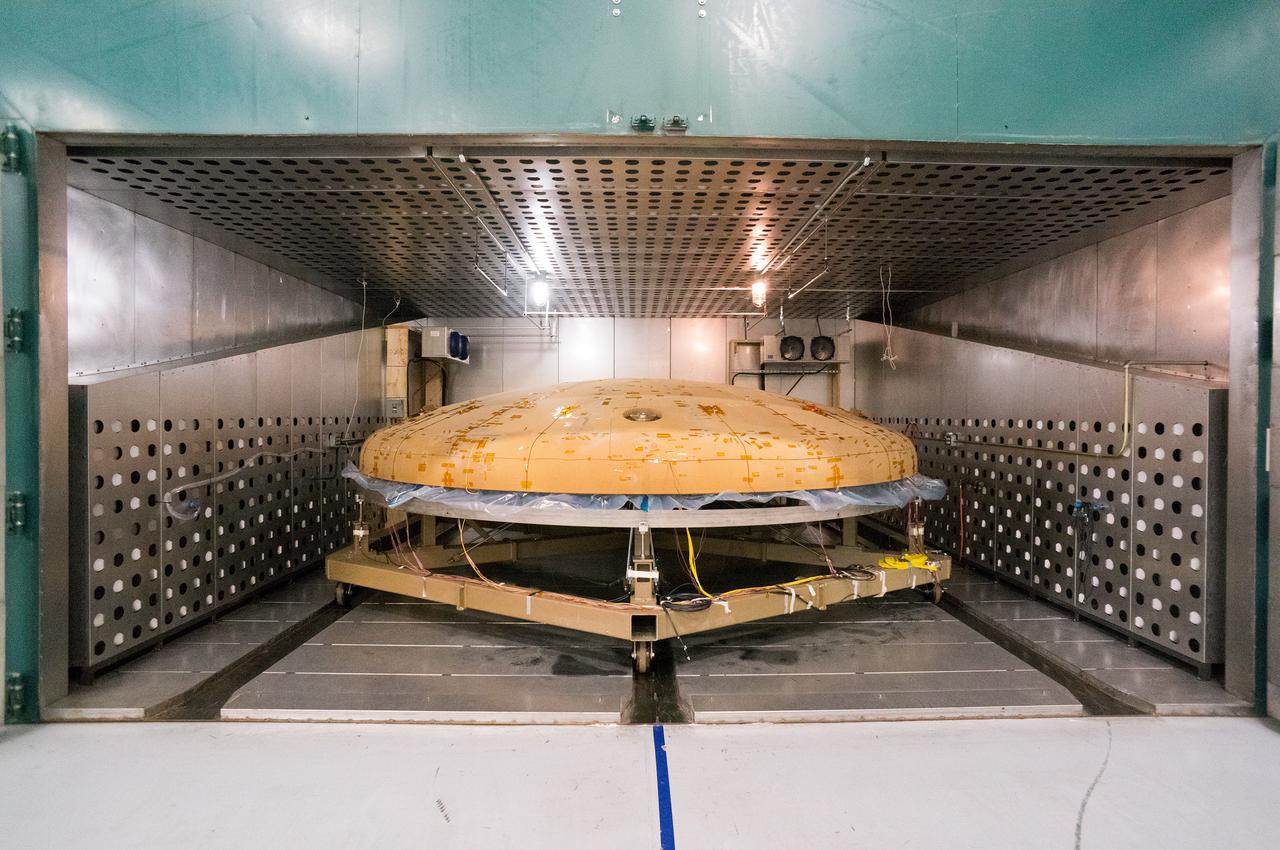 Technicians at Textron in Wimington, MA, inspect the Exploration Flight Test-1 (EFT-1) Orion heat shield after a cold soak test on Nov. 22, 2013. Part of Batch image transfer from Flickr.