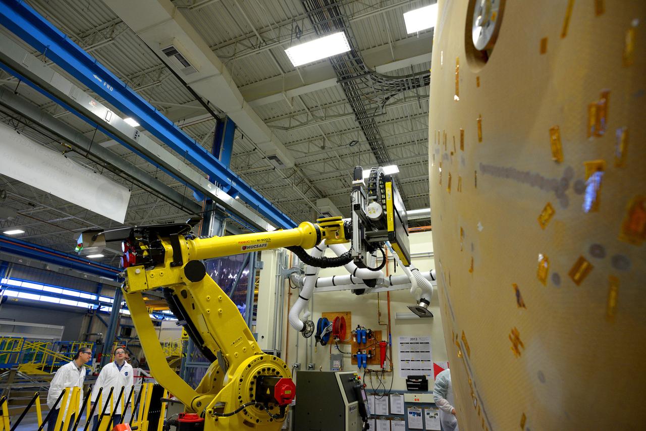 Technicians at Textron in Wimington, MA, perform X-ray testing on the Exploration Flight Test-1 (EFT-1) Orion heat shield on Nov. 23, 2013. Part of Batch image transfer from Flickr.