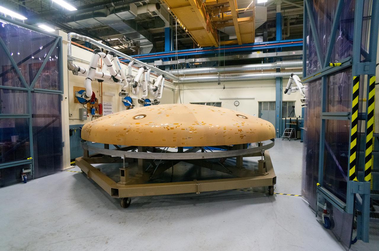 Technicians at Textron in Wimington, MA, perform X-ray testing on the Exploration Flight Test-1 (EFT-1) Orion heat shield on Nov. 23, 2013. Part of Batch image transfer from Flickr.