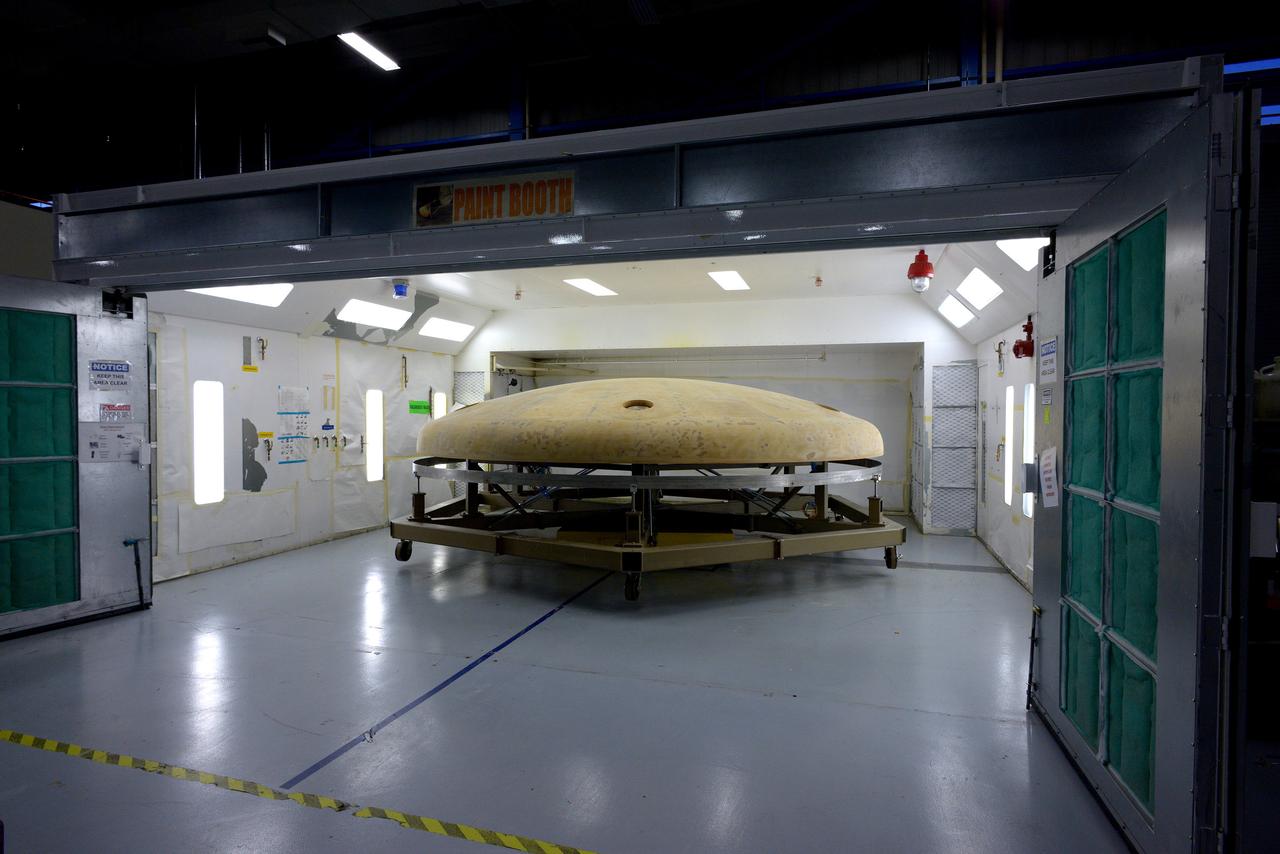 Technicians at Textron in Wimington, MA, perform final sanding on the Exploration Flight Test-1 (EFT-1) Orion heat shield on Nov. 25, 2013. Part of Batch image transfer from Flickr.