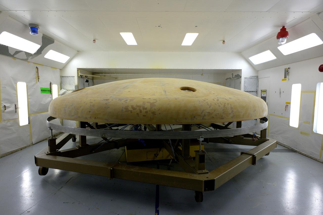 Technicians at Textron in Wimington, MA, perform final sanding on the Exploration Flight Test-1 (EFT-1) Orion heat shield on Nov. 25, 2013. Part of Batch image transfer from Flickr.