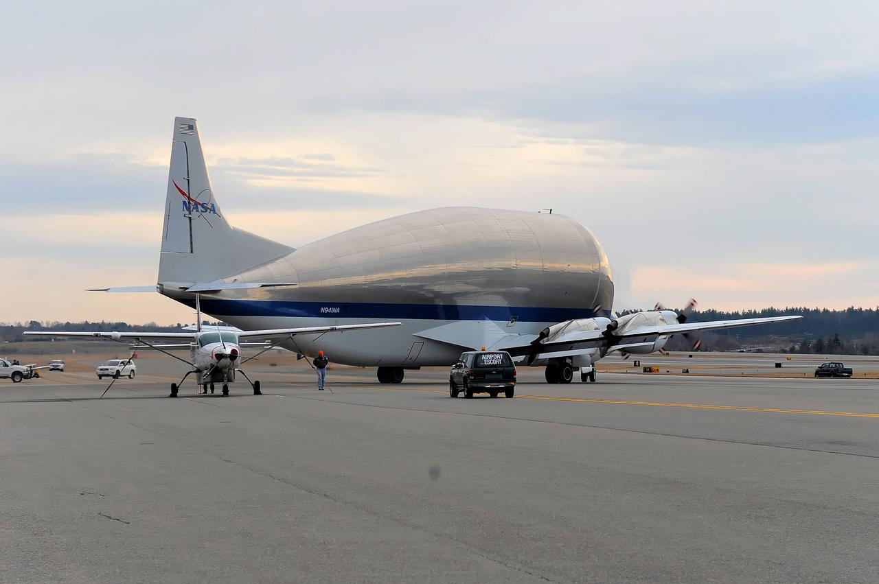 NASA's Super Guppy transport plane transports the Exploration Flight Test-1 (EFT-1) Orion heat shield from Manchester, NH to the Kennedy Space Center in Florida on Dec. 4, 2013. Part of Batch image transfer from Flickr.